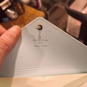 Real Louis Vuitton leather turquoise pouch.